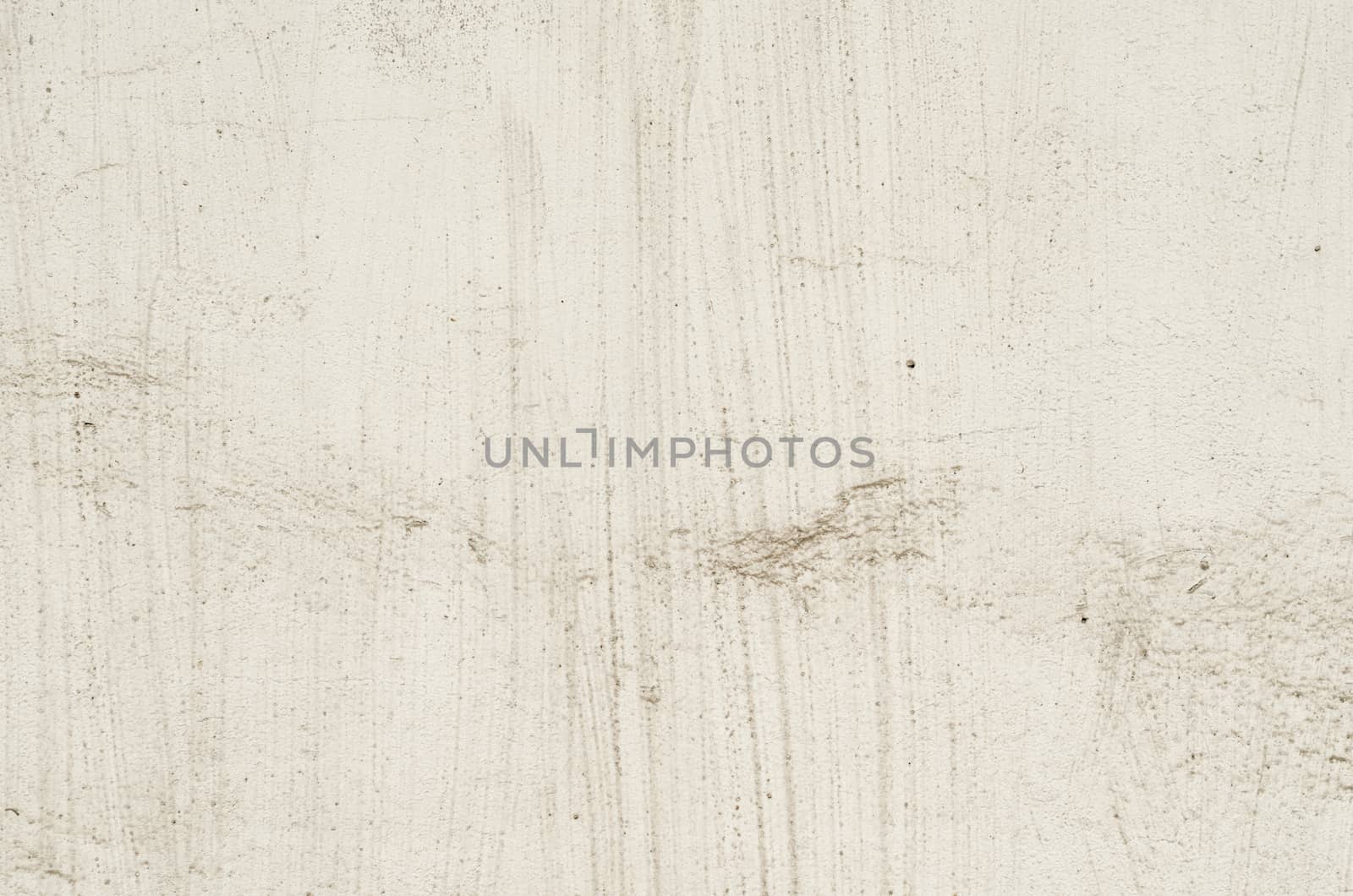 beige texture old concrete wall with remnants of plaster