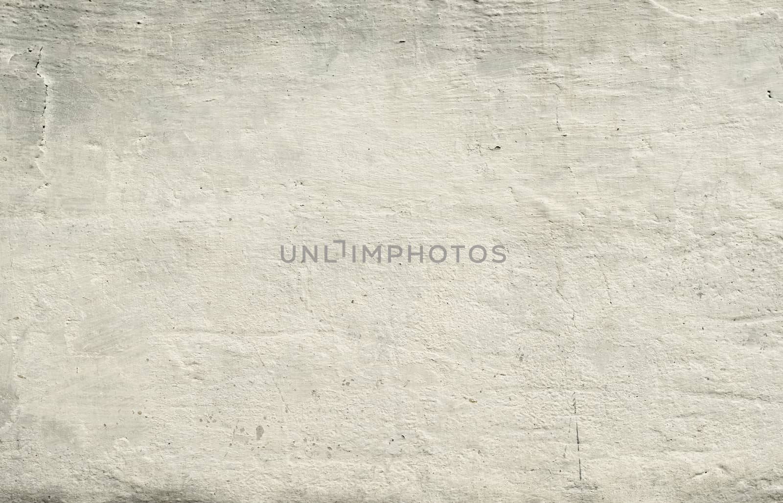white texture old concrete wall with remains of plaster