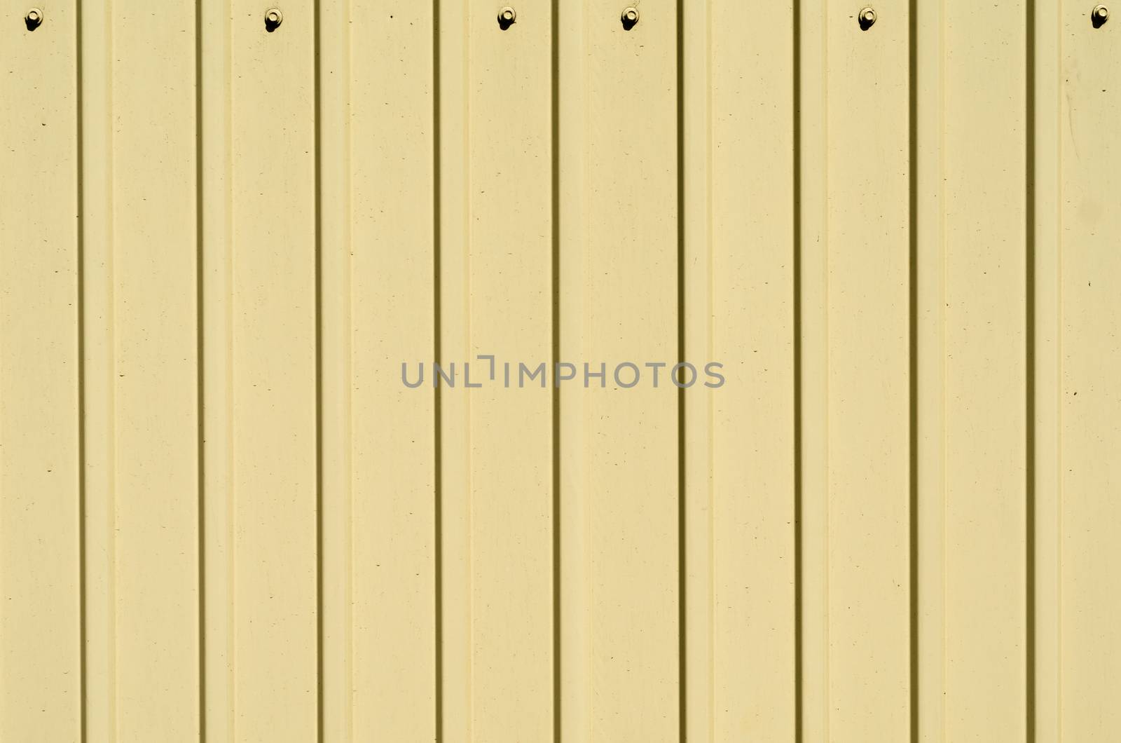 yellow texture metal profiled surface with bolts