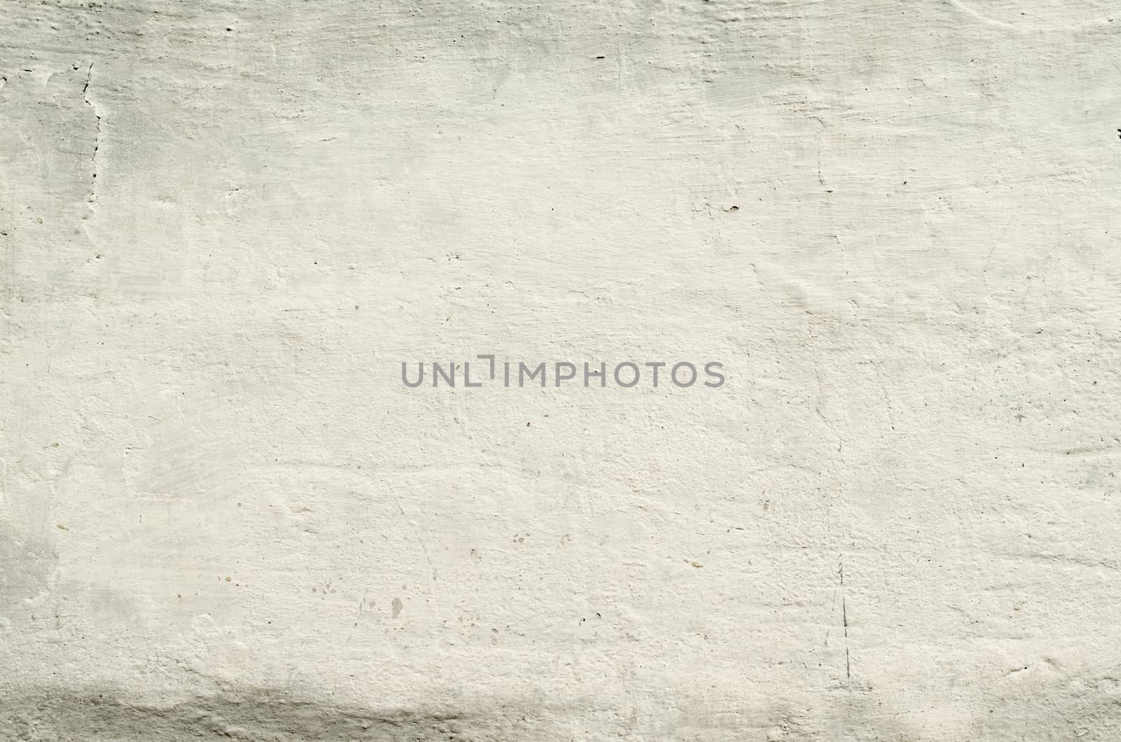 white texture old concrete wall with remains of plaster with cracks
