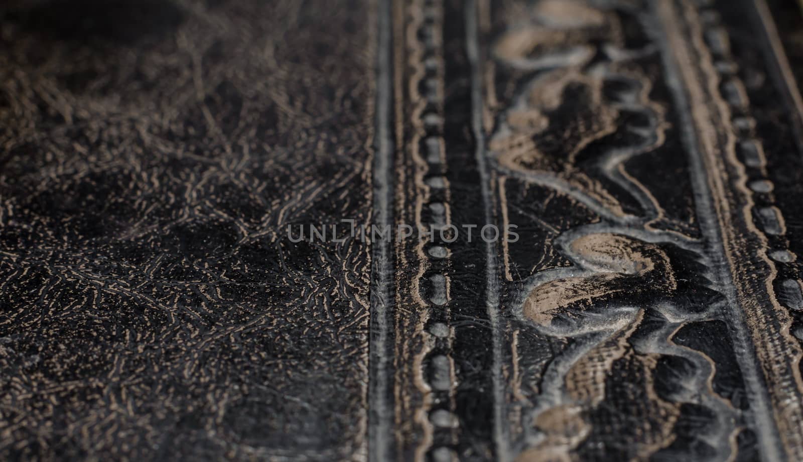 fragment of leather cover of an old book macro closeup