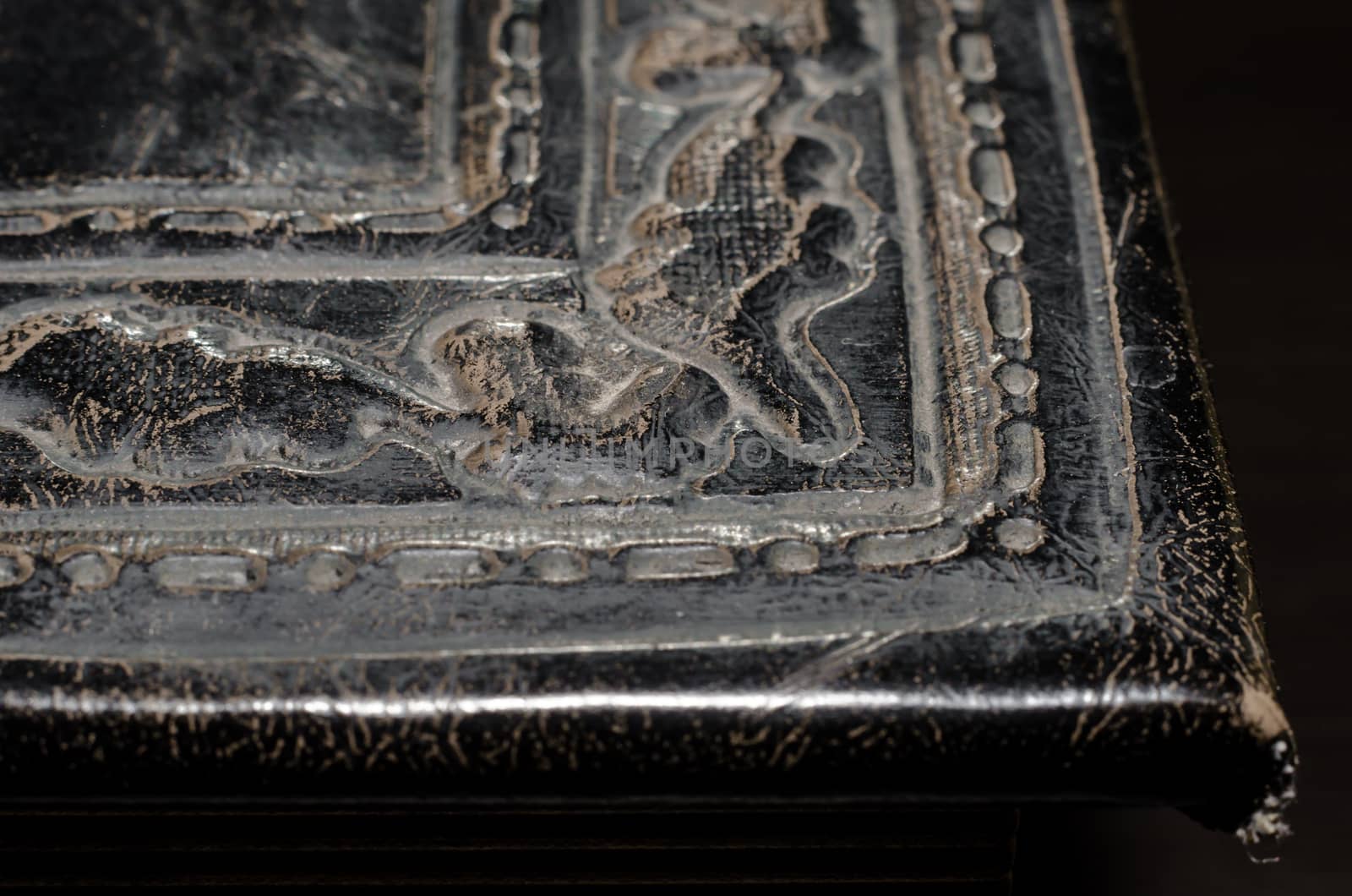 fragment of leather cover of an old book macro closeup