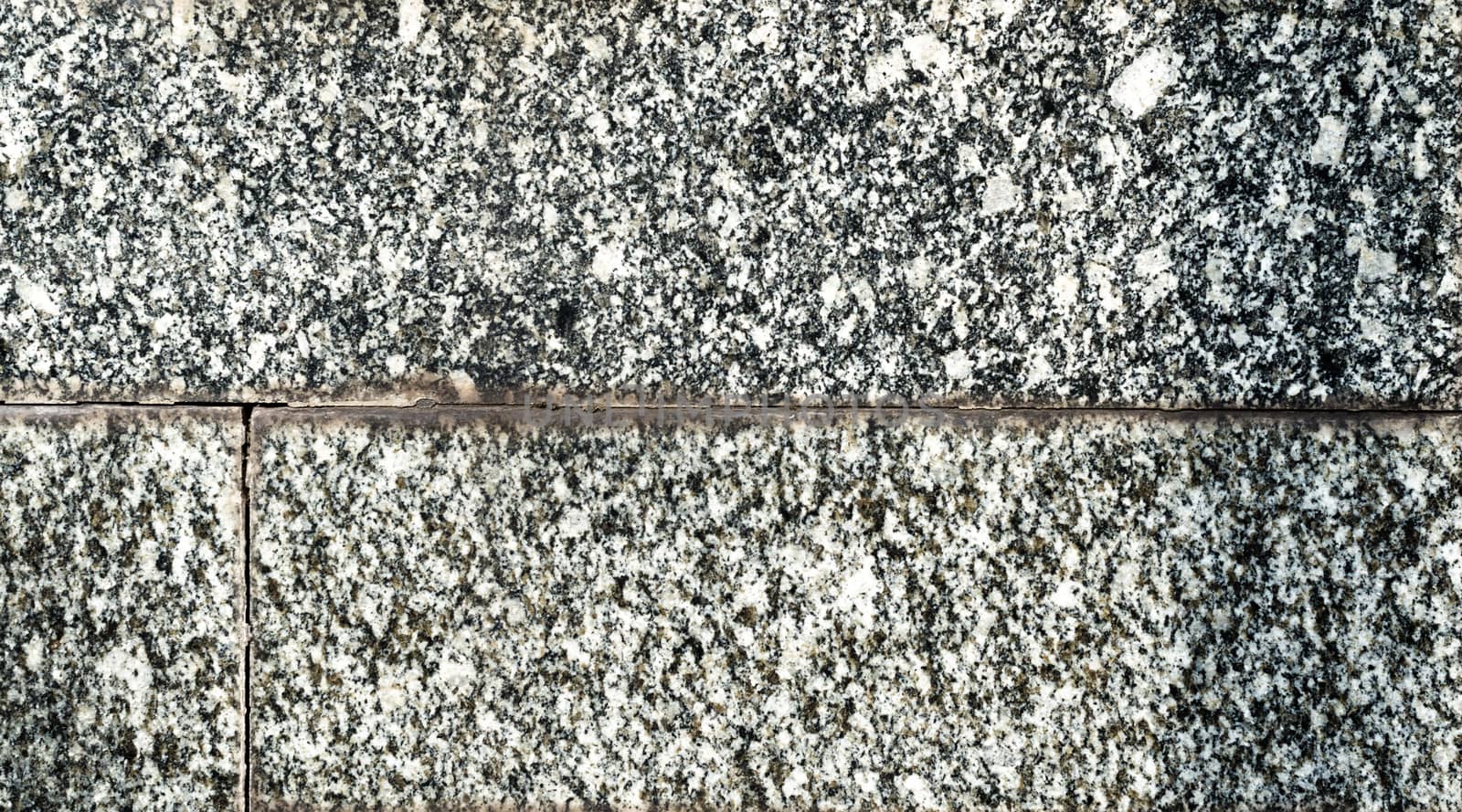 texture of old granite tiles on the wall