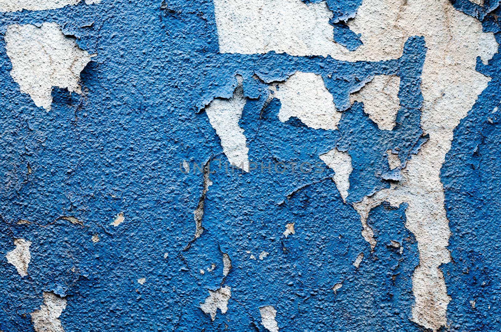 texture old wall with traces of blue paint