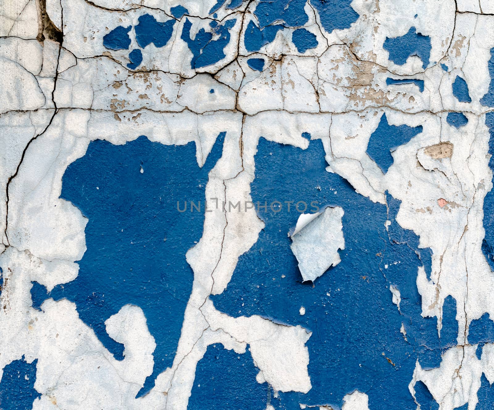 texture old wall with traces of blue paint