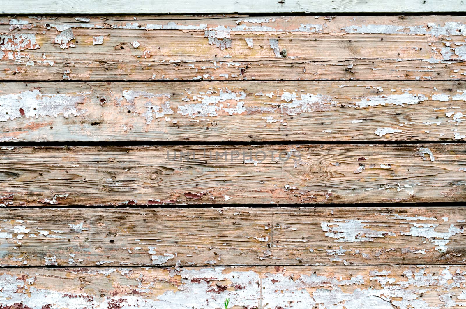 texture old wooden wall with traces of paint
