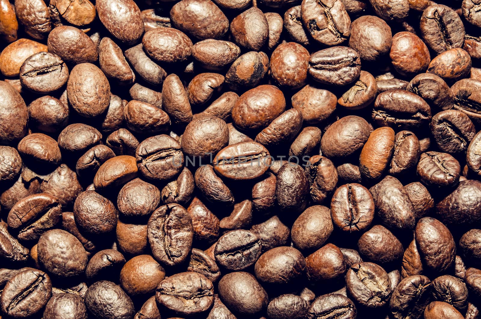 texture whole fried grains of coffee macro