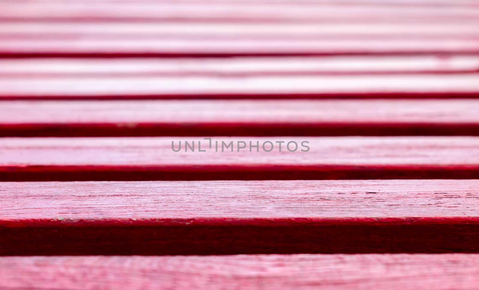 texture wooden boards painted red paint close-up