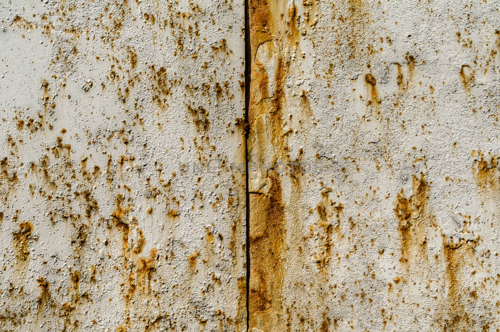 texture of a gray painted metal surface with rust