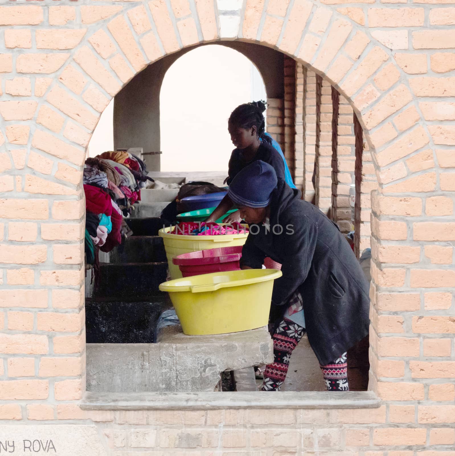 Madagascar on july 26, 2019 - Women washing clothes by hand