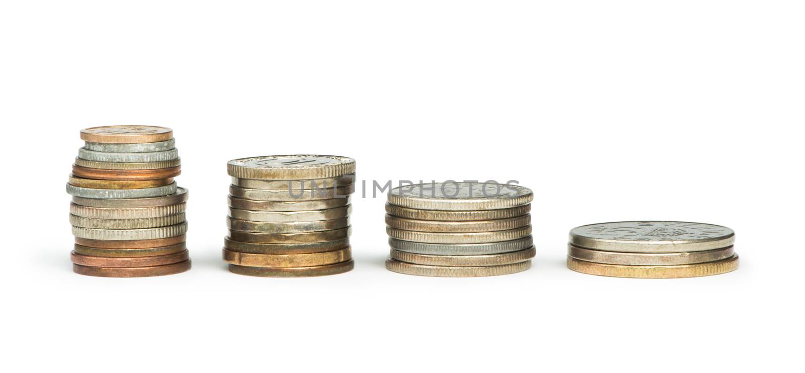 Stacks of coins white isolated studio shot