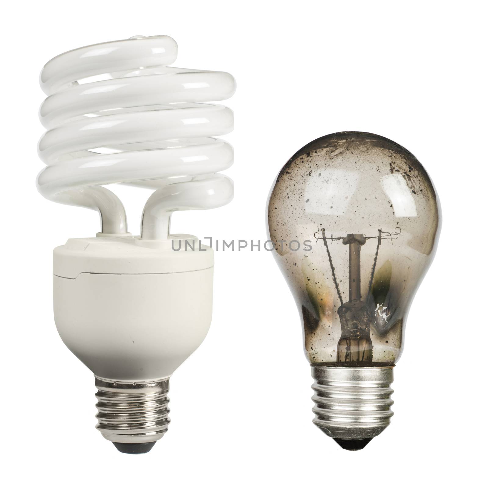 Ecological economical lamp and old burned lamp on white background.