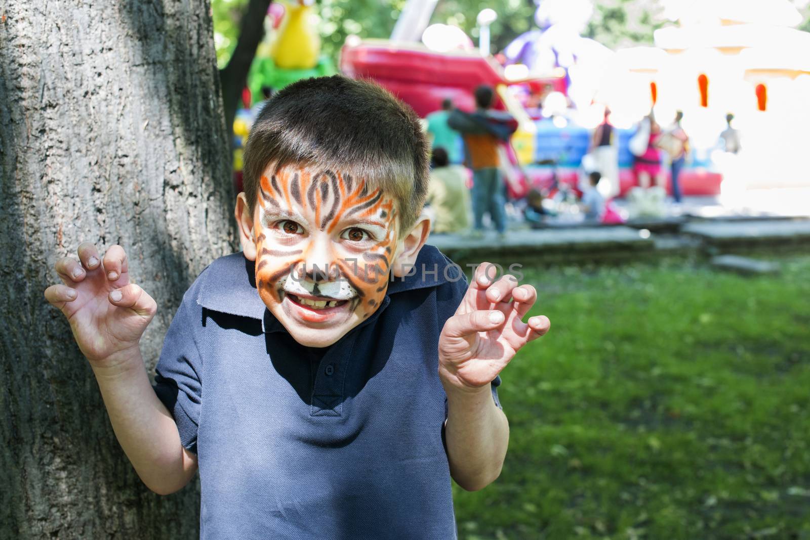 Child with painted face by deyan_georgiev