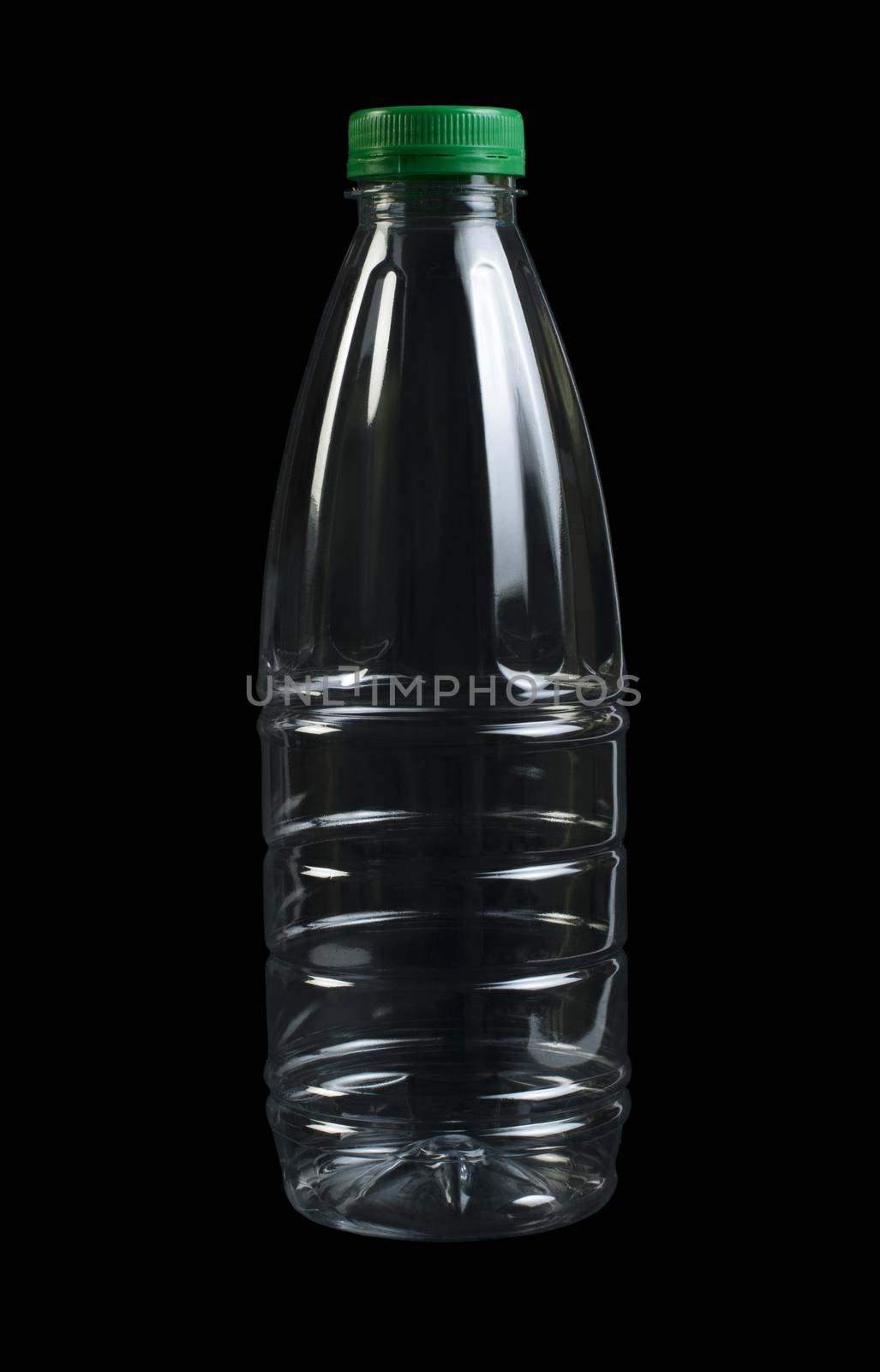 Empty transparent plastic bottle. Black isolated. Green cap