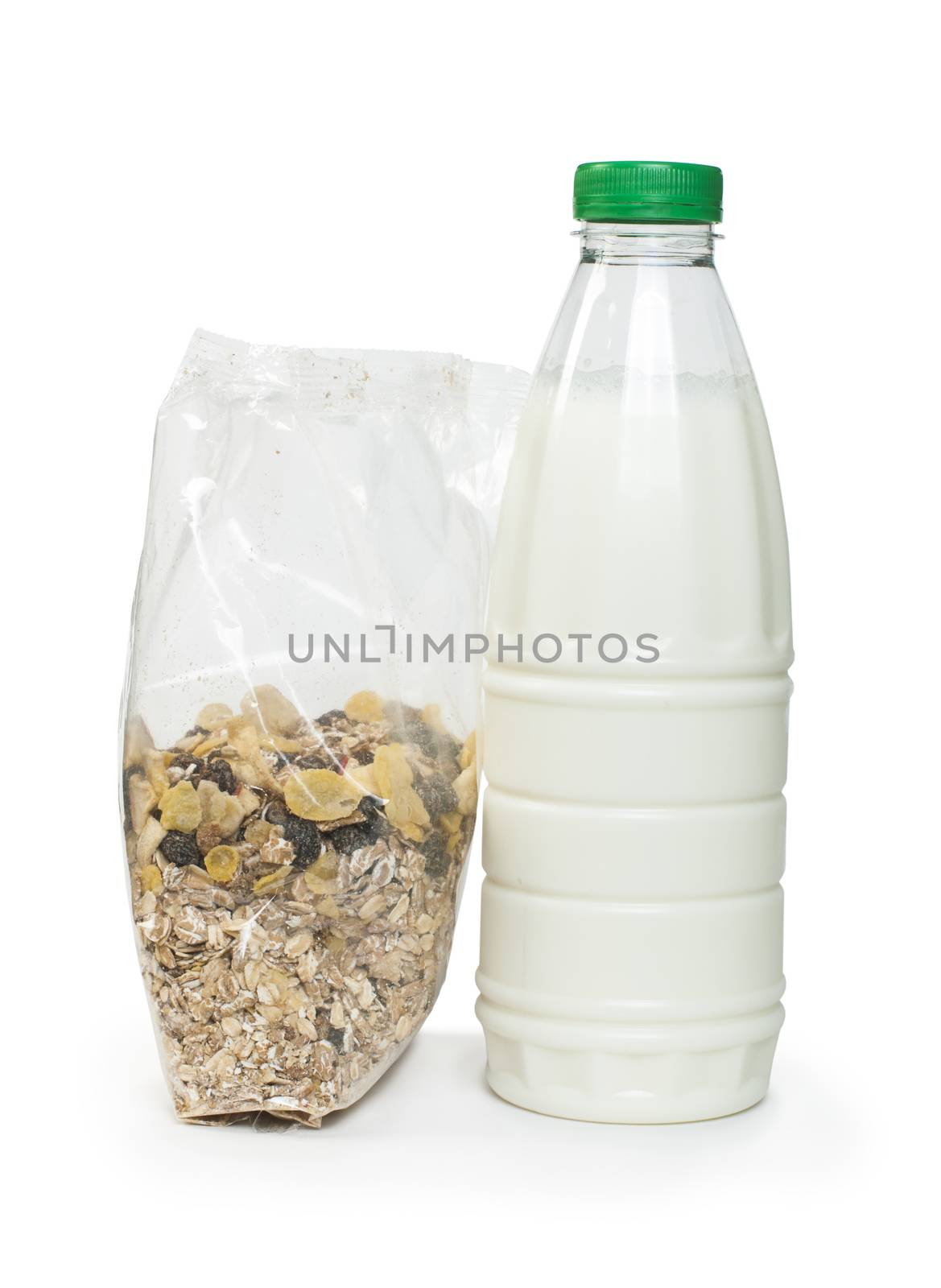 Muesli breakfast in package and bottle milk. White isolated