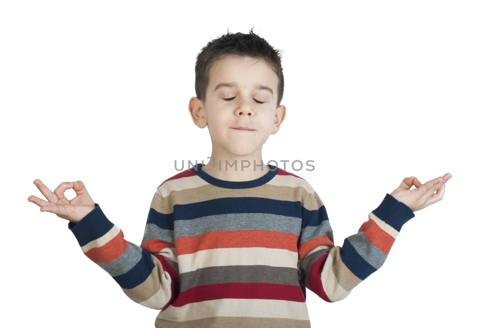 Child meditate. Studio shot white isolated.