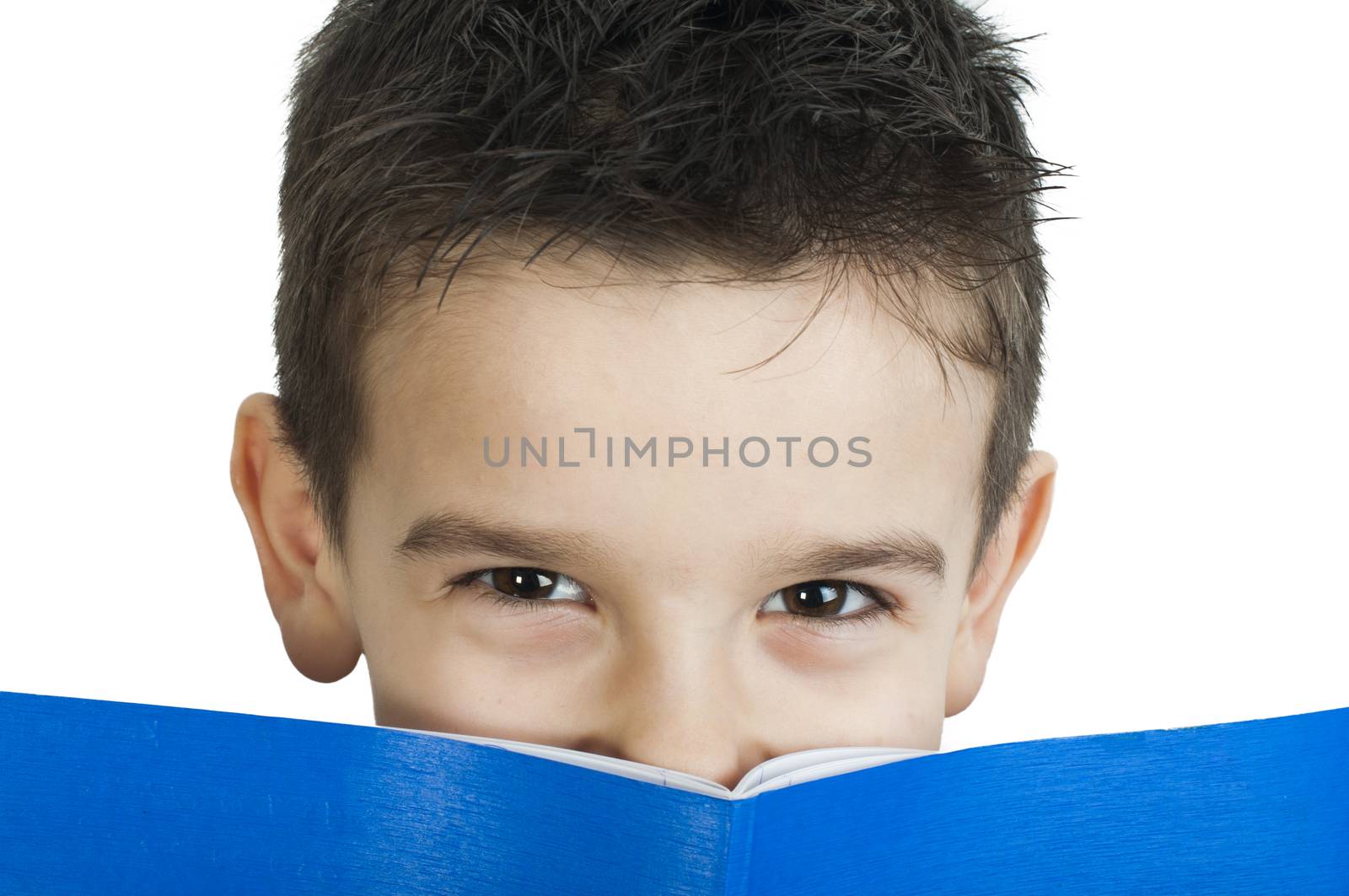 Child with notebook in front of the face by deyan_georgiev
