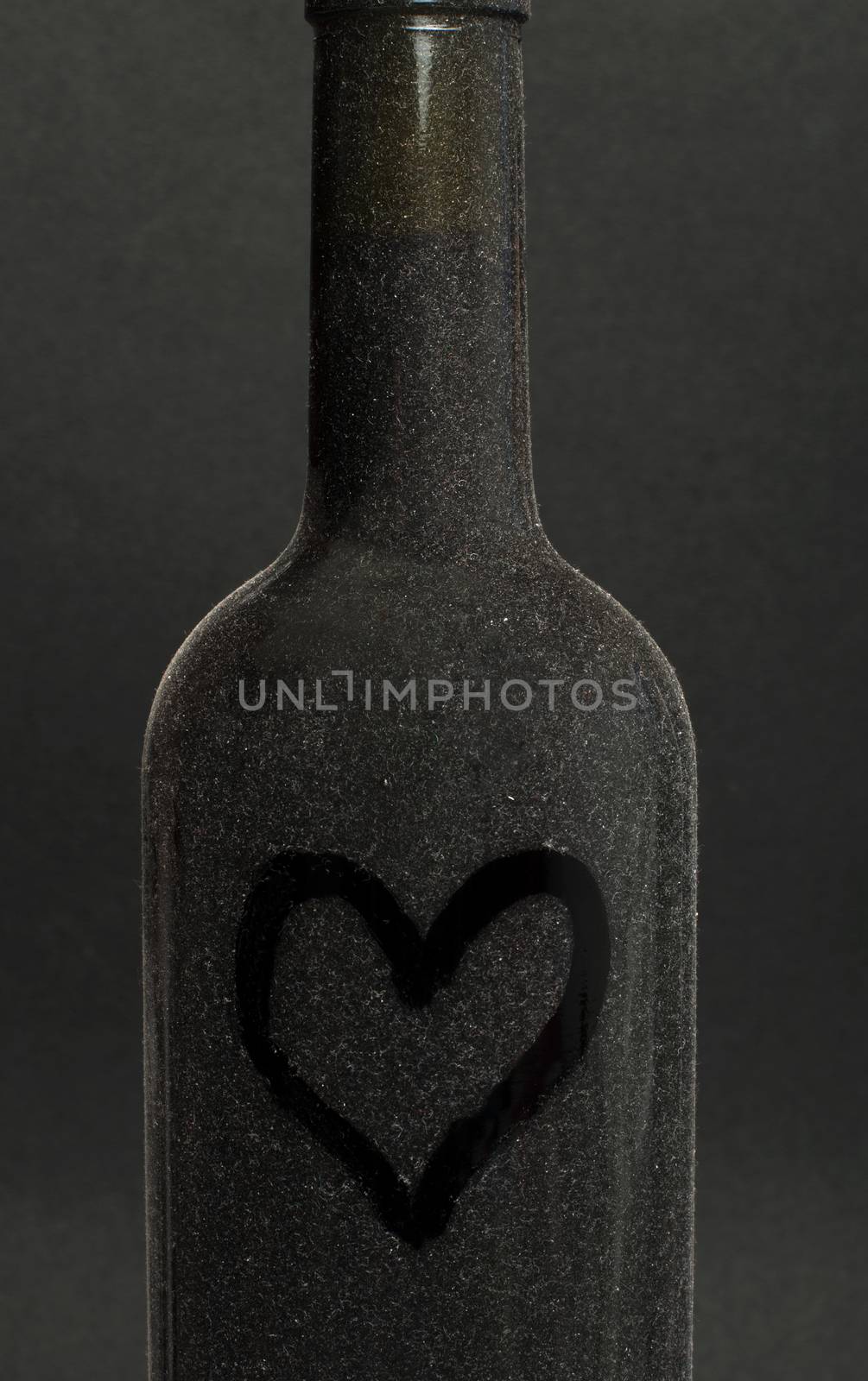 Heart painted on a wine bottle by deyan_georgiev