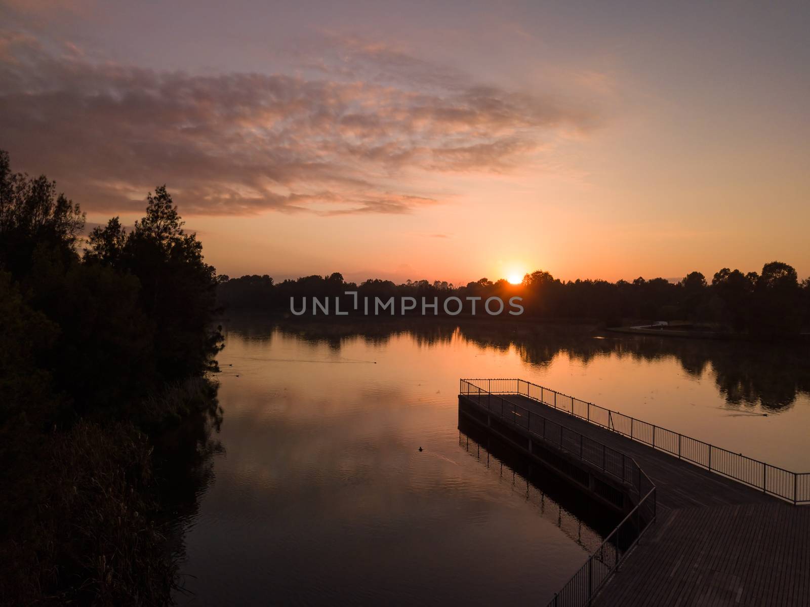 Sunrise on the lake by lovleah