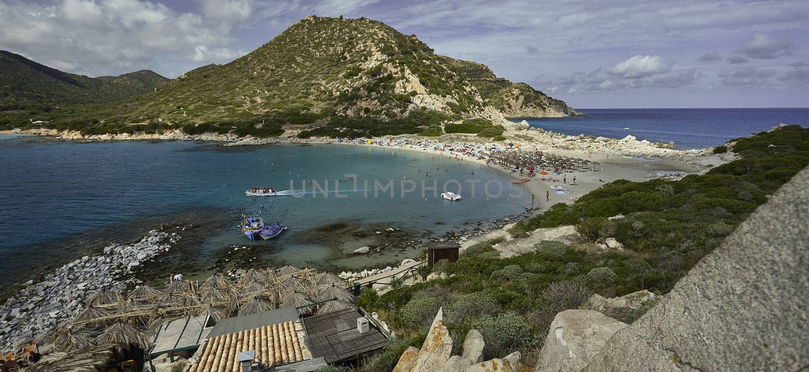A corner of paradise: Punta Molentis beach immersed in the typical colors of Sardinian beaches on a summer day.