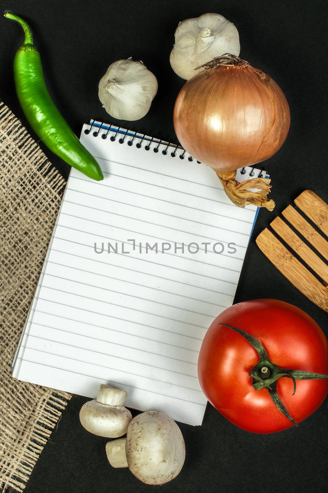 Notebook to write recipes and vegetables around it