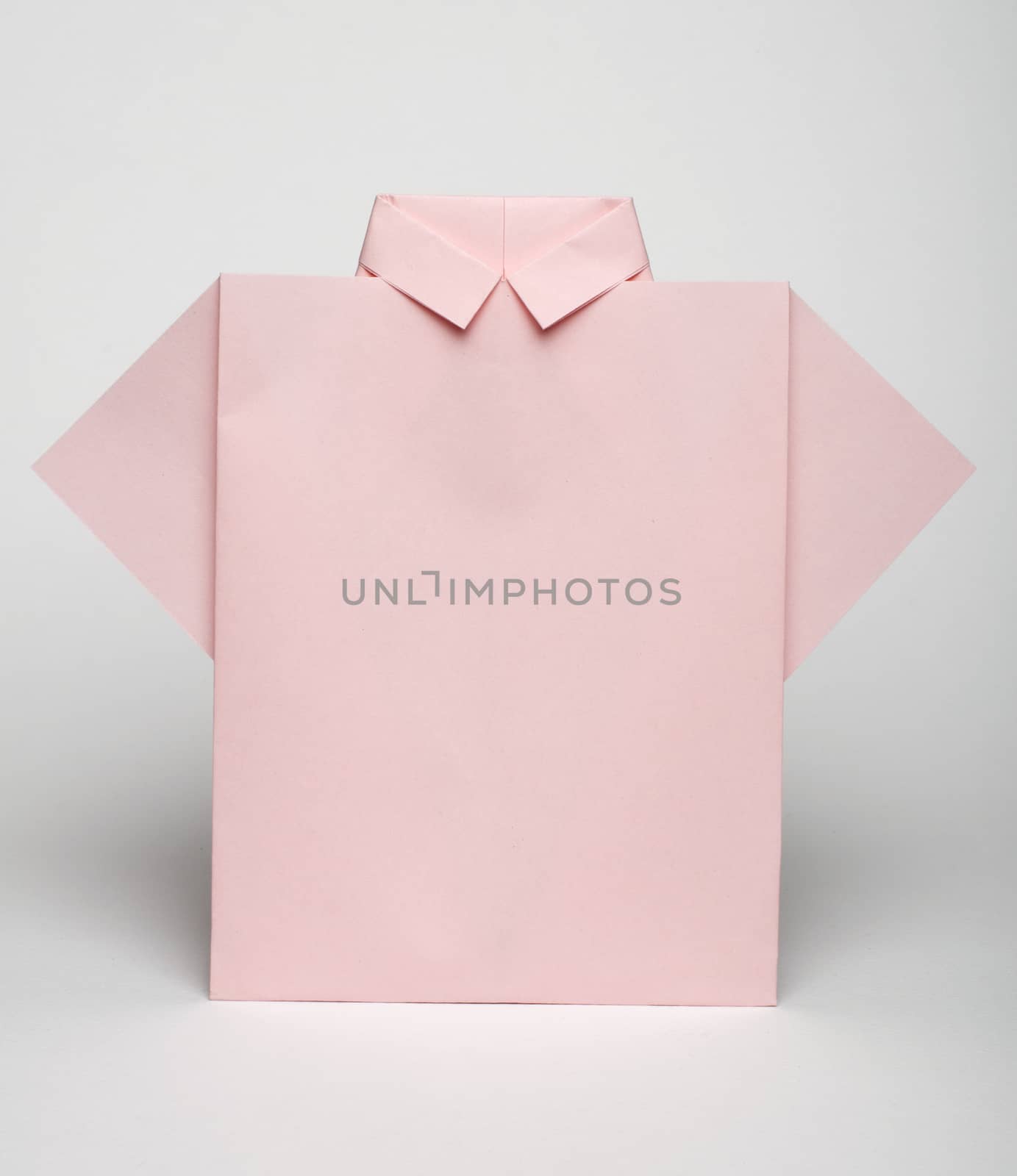 Isolated paper made pink shirt  by deyan_georgiev