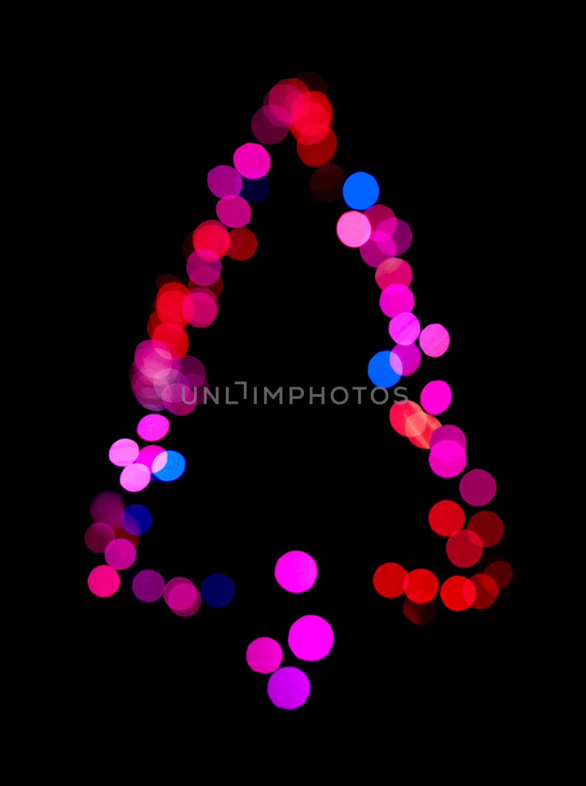 Christmas tree made ​​of bokeh lights.Pink and blue colors.