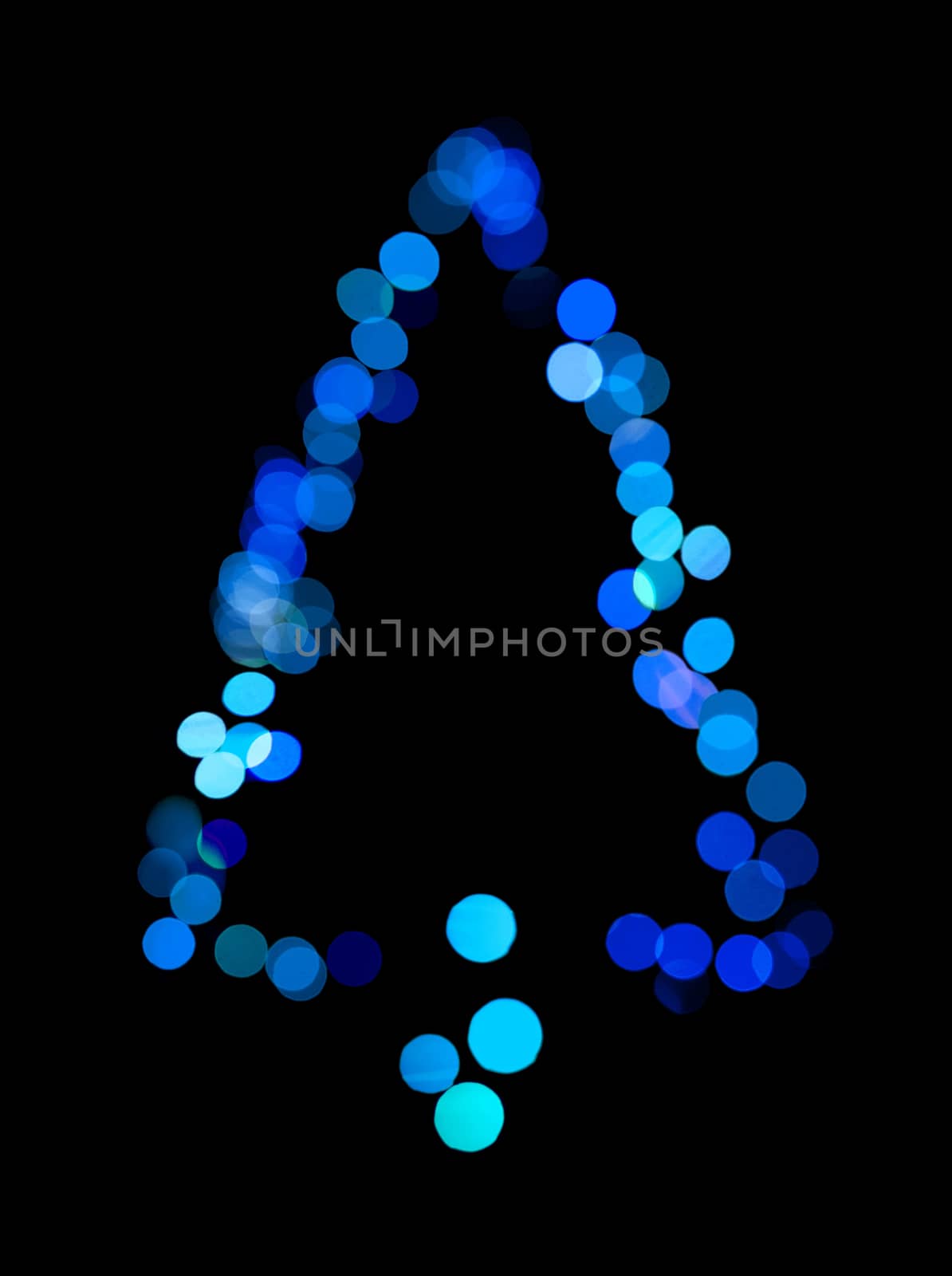 Christmas tree made ​​of bokeh lights.Blue colors