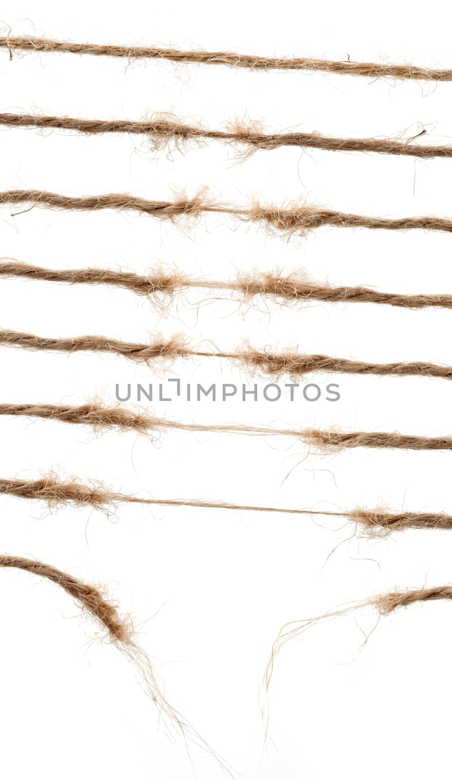 Torn broun natural hemp rope. Set of torn ropes.