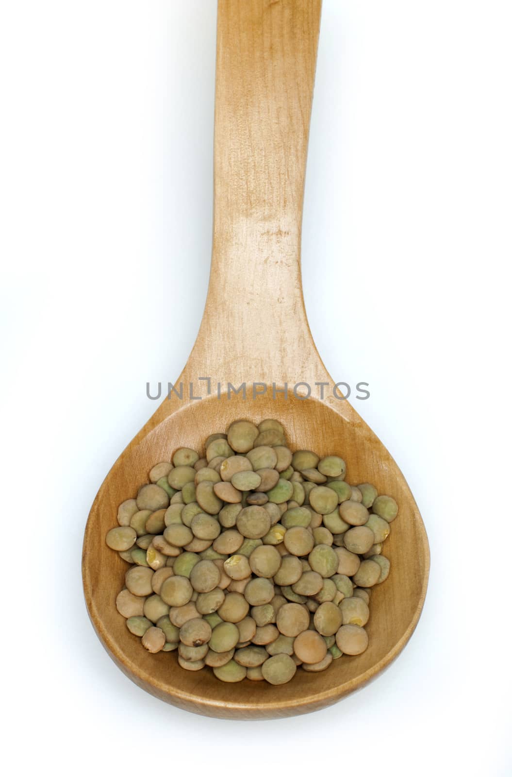 Lentil canada in wooden spoon on white background