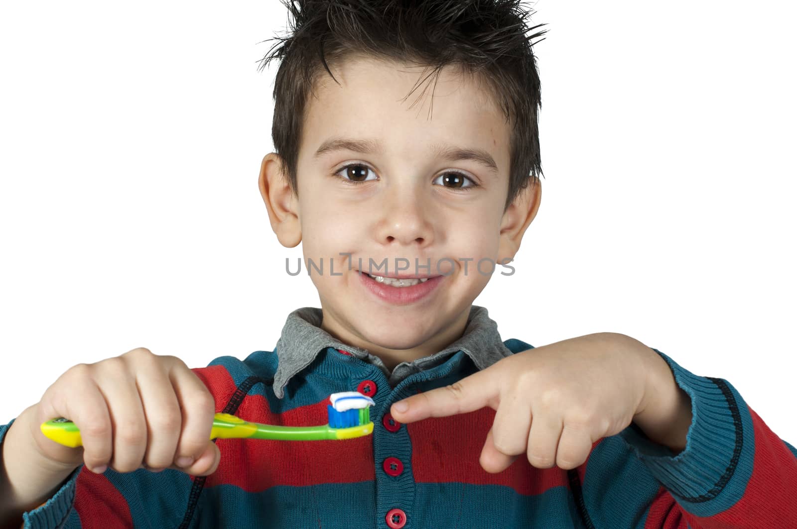 Boy brushing his teeth. White isolated