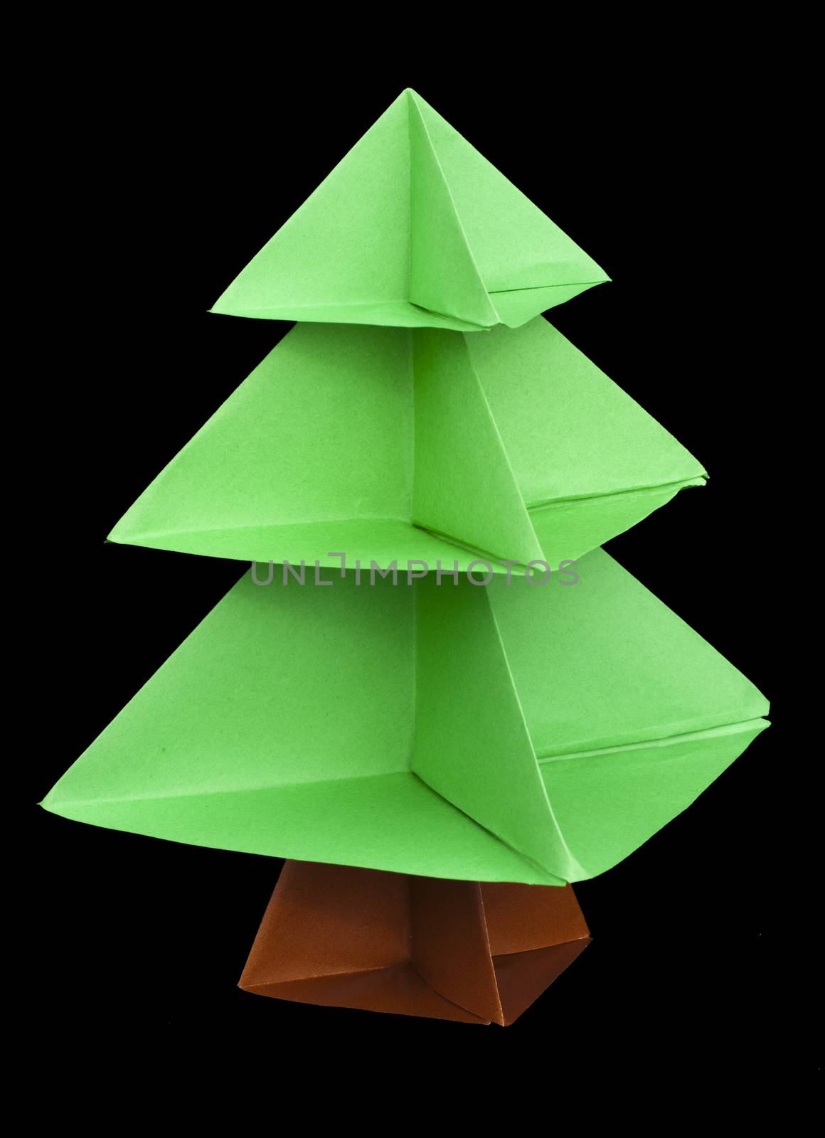 Christmas tree made of paper. Origami evergreen tree