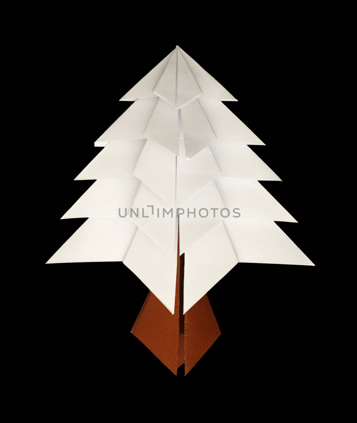 White christmas tree made of paper. Origami evergreen tree by deyan_georgiev