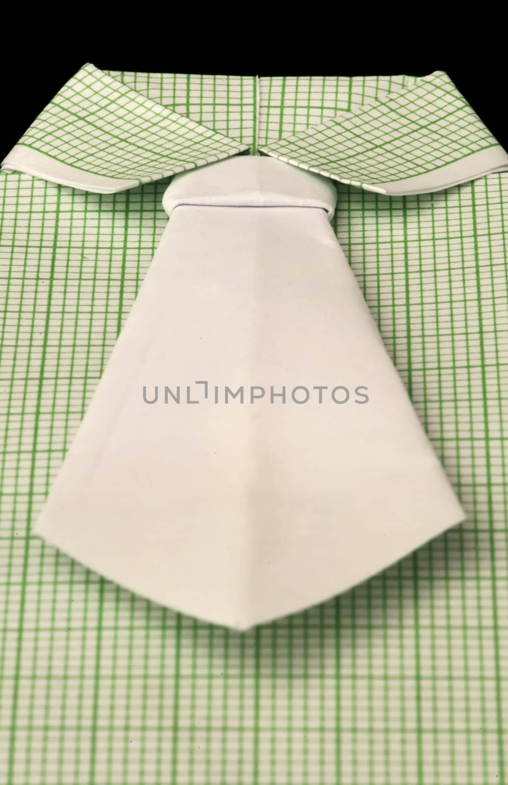 Isolated paper made green plaid shirt. by deyan_georgiev