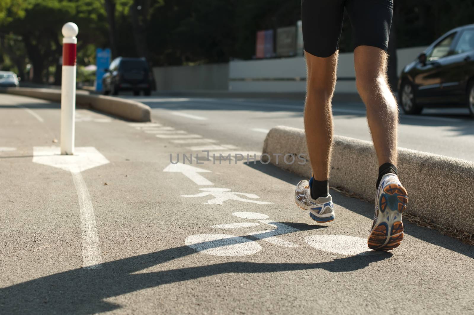 Human feets in sportshoes running  by deyan_georgiev