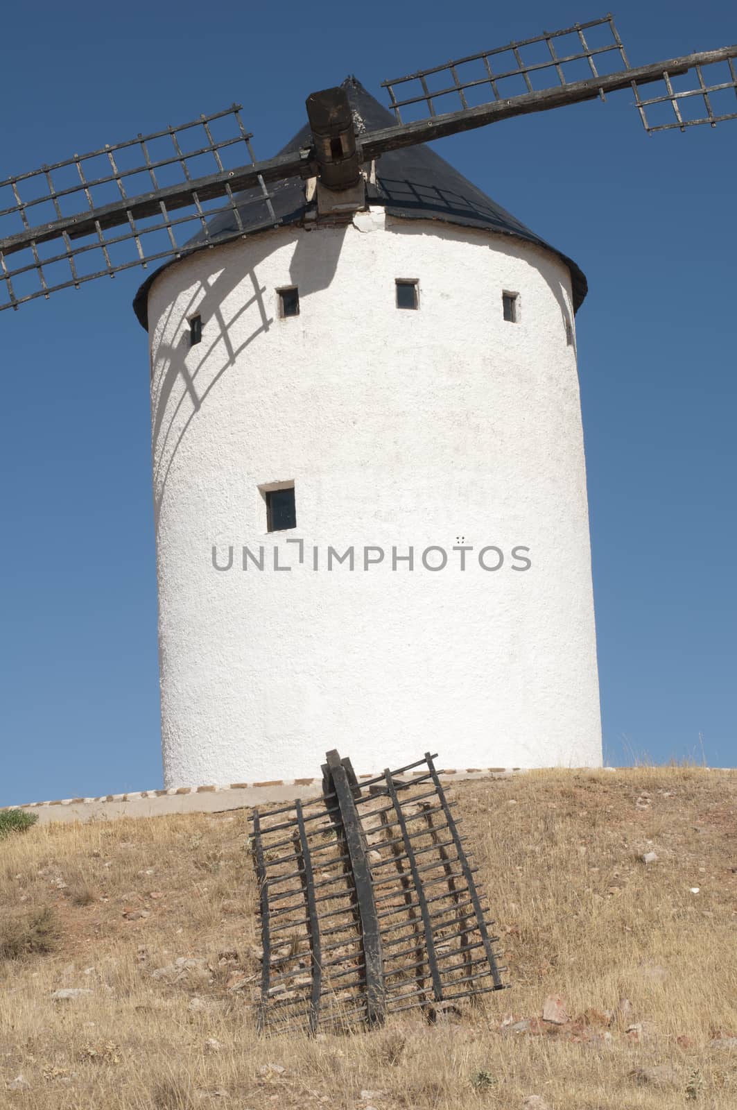 White ancient windmill by deyan_georgiev