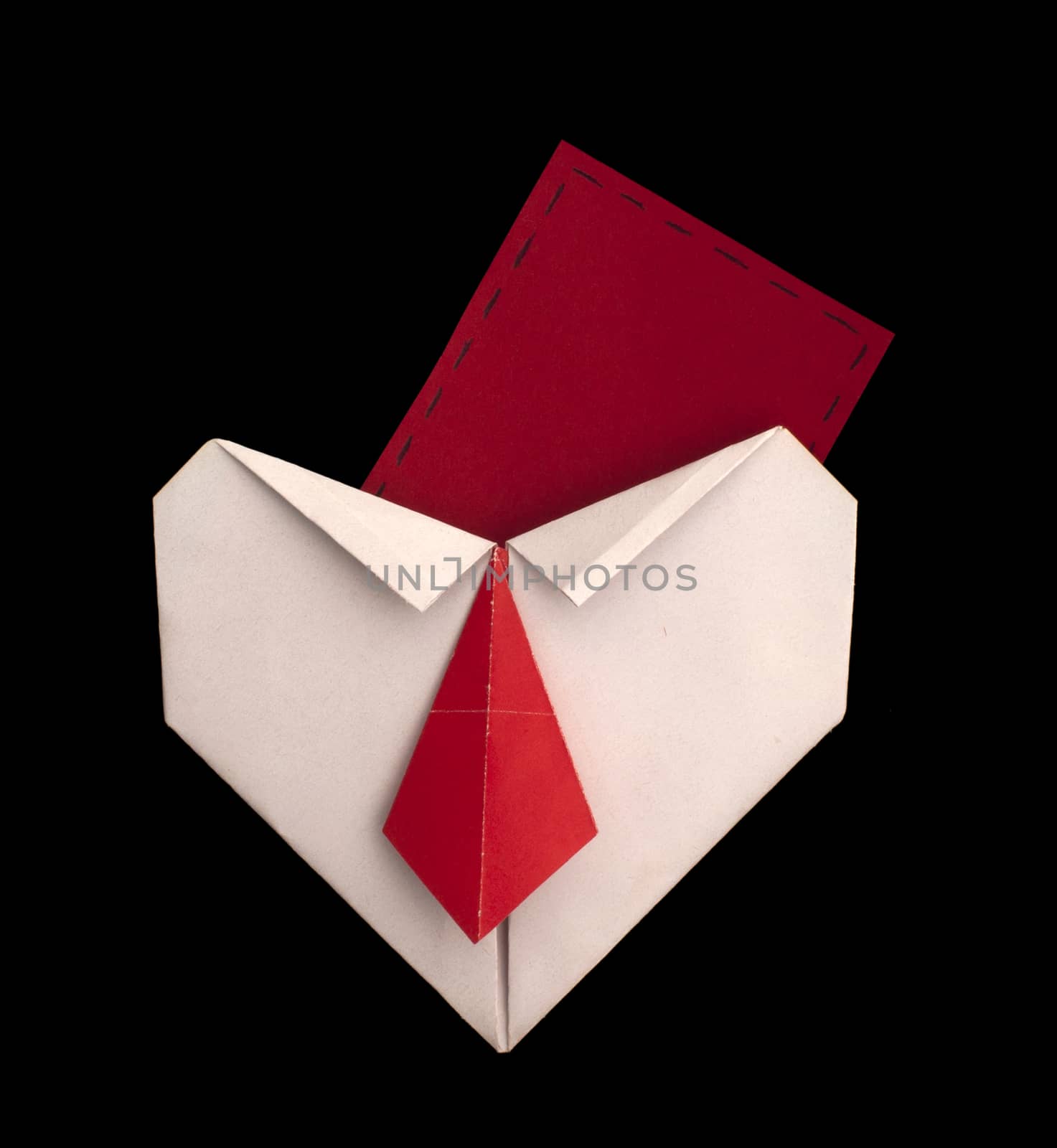 White heart paper made. Isolated heart and note