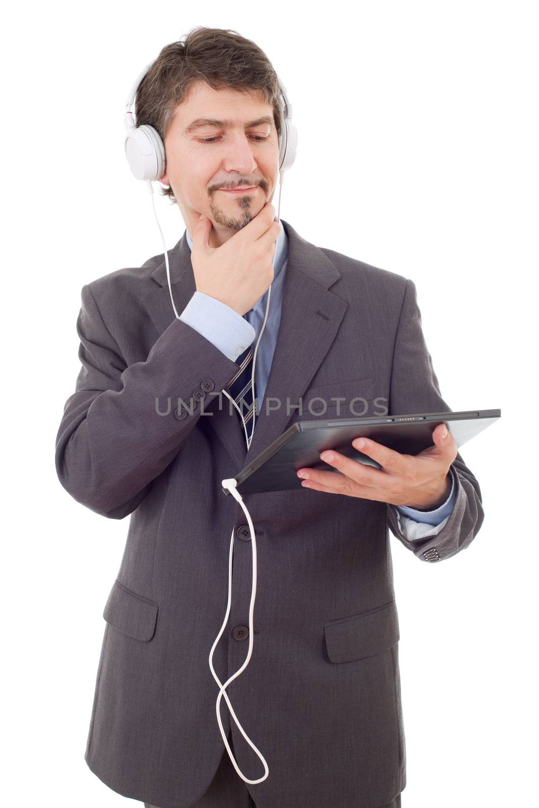 businessman with tablet pc and headphones, isolated