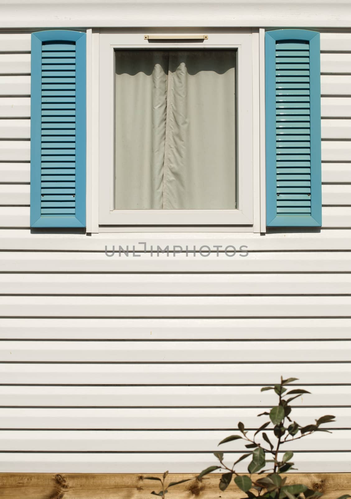 Window with wooden shutters by deyan_georgiev