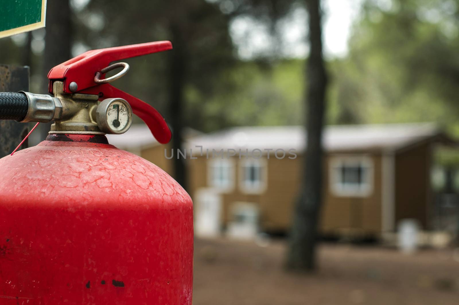 Red fire extinguisher and mobile homes. Fire safety