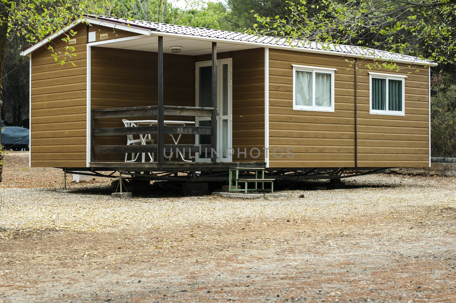 Mobile homes, brown bungalow in a camping.