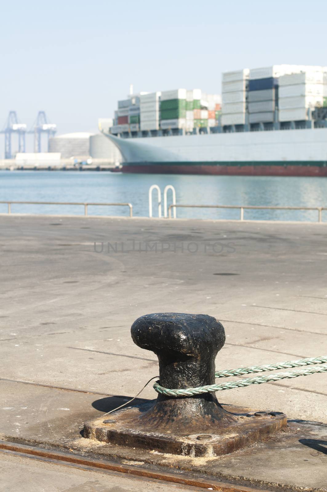 Ship moored to pier, view from the bollard by deyan_georgiev