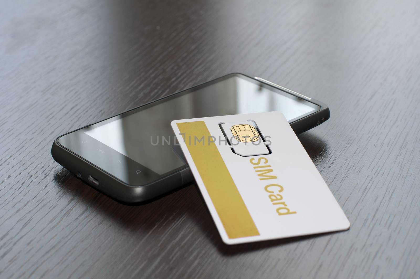 SIM card and mobile phone by deyan_georgiev