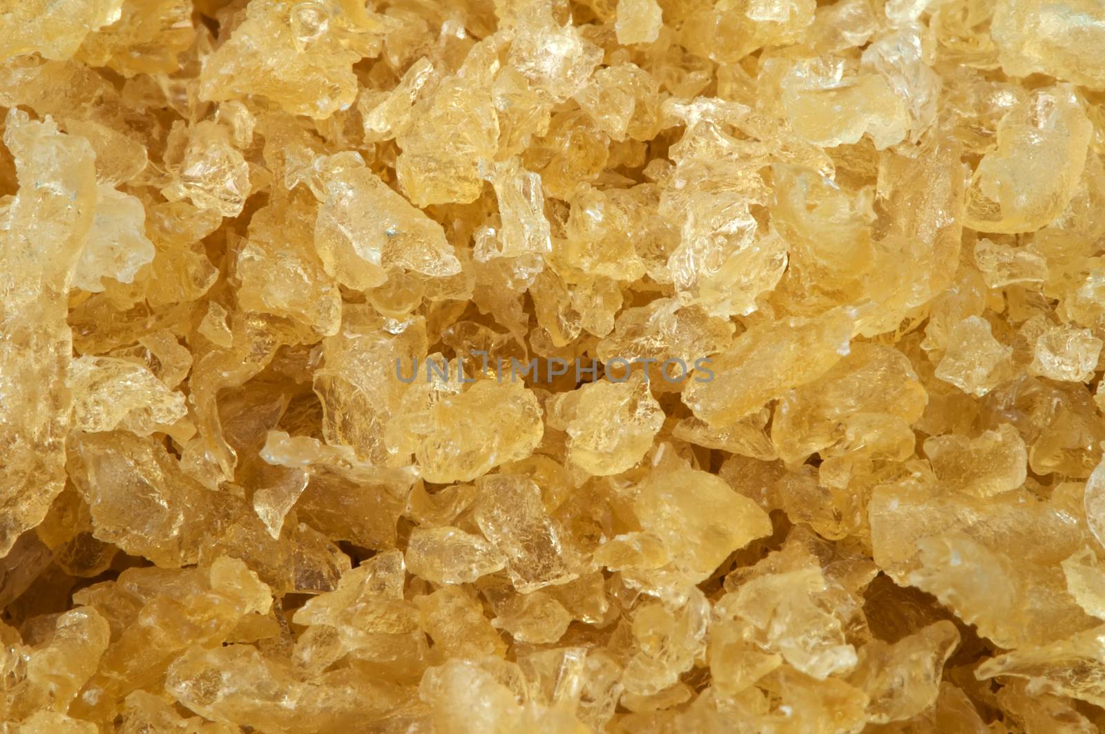 Cooking gelatin yellow crystals closeup