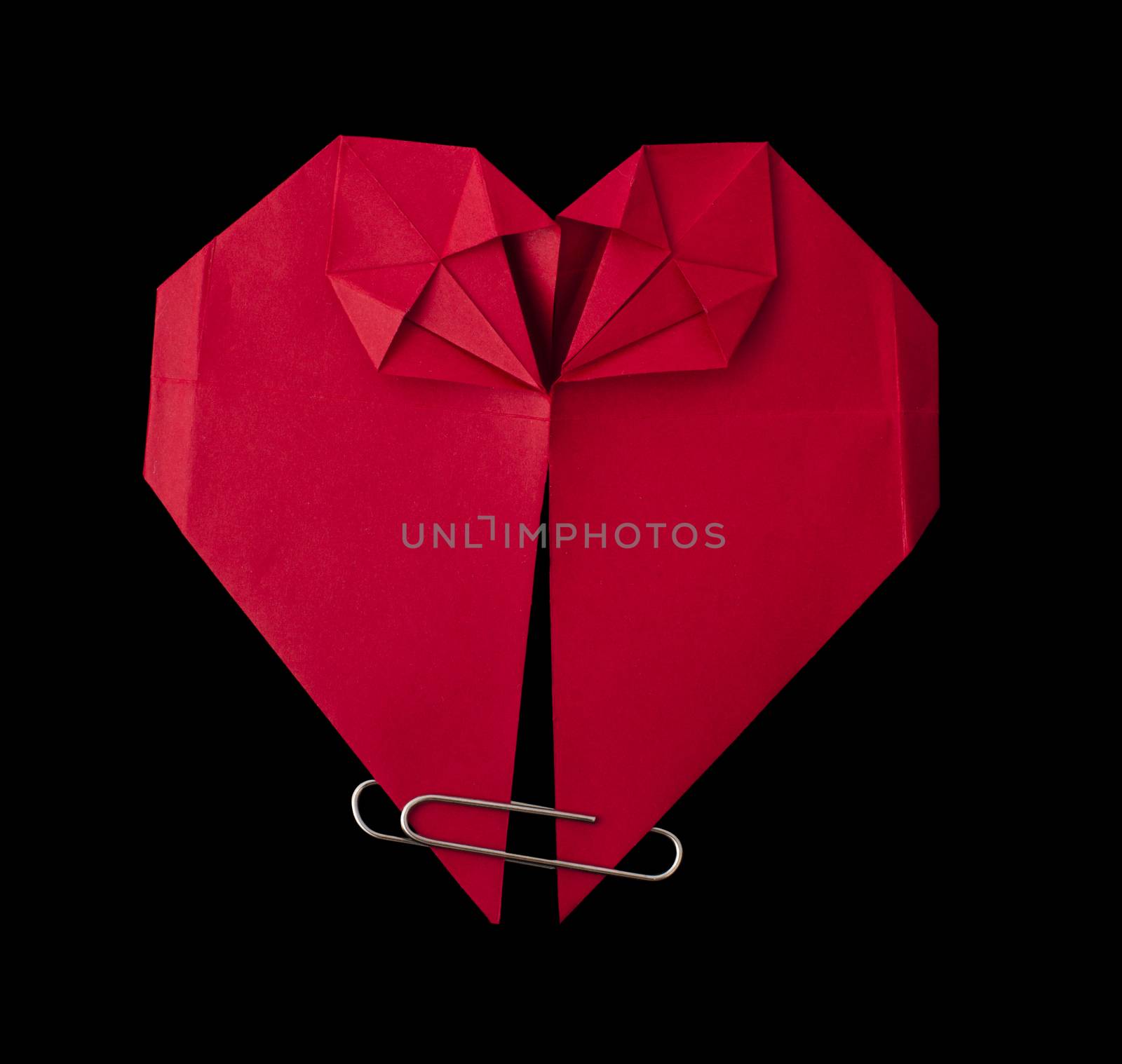 Origami red heart. Black isolated