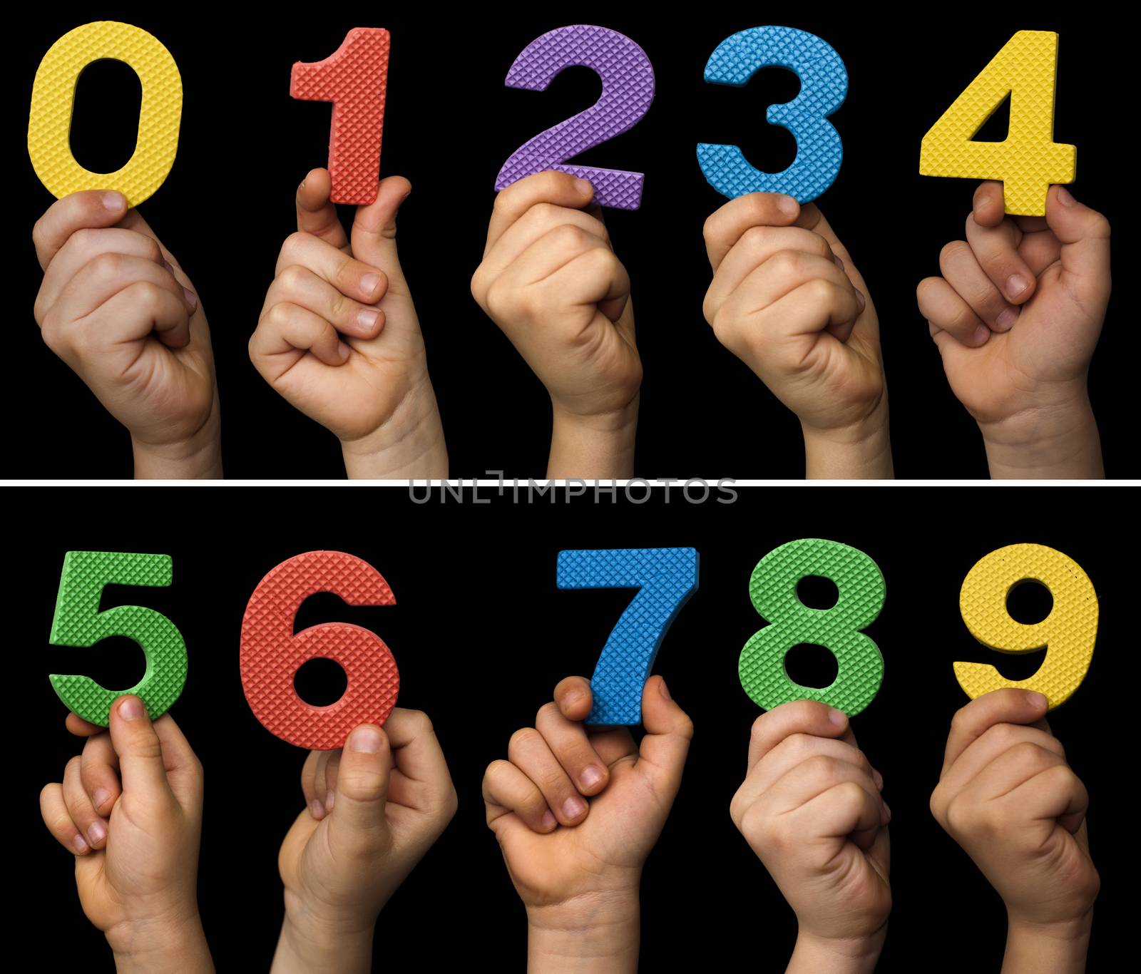 Children hands holding numbers. Black isolated multicolor number by deyan_georgiev
