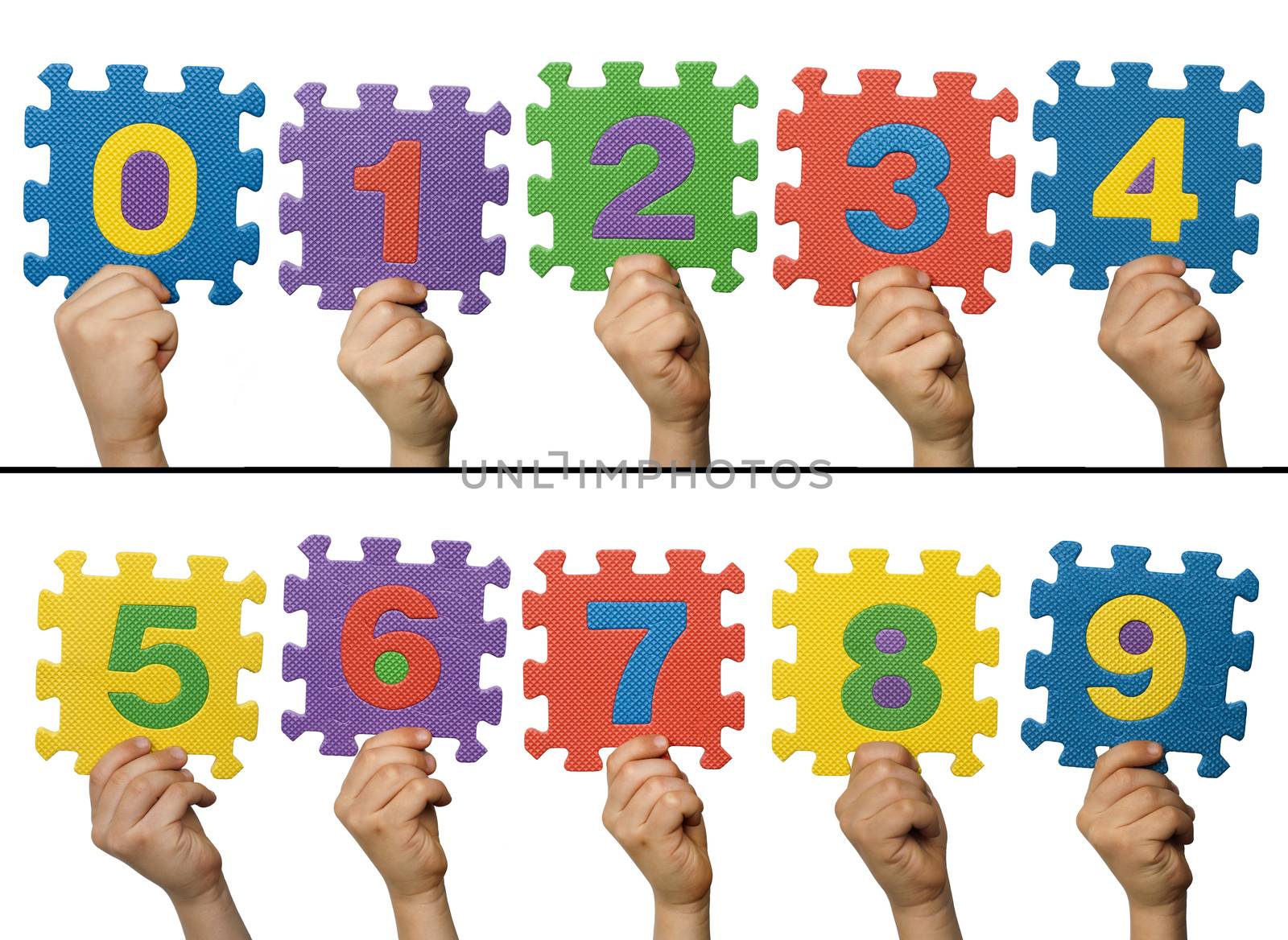 Children hands holding numbers. White isolated multicolor number by deyan_georgiev