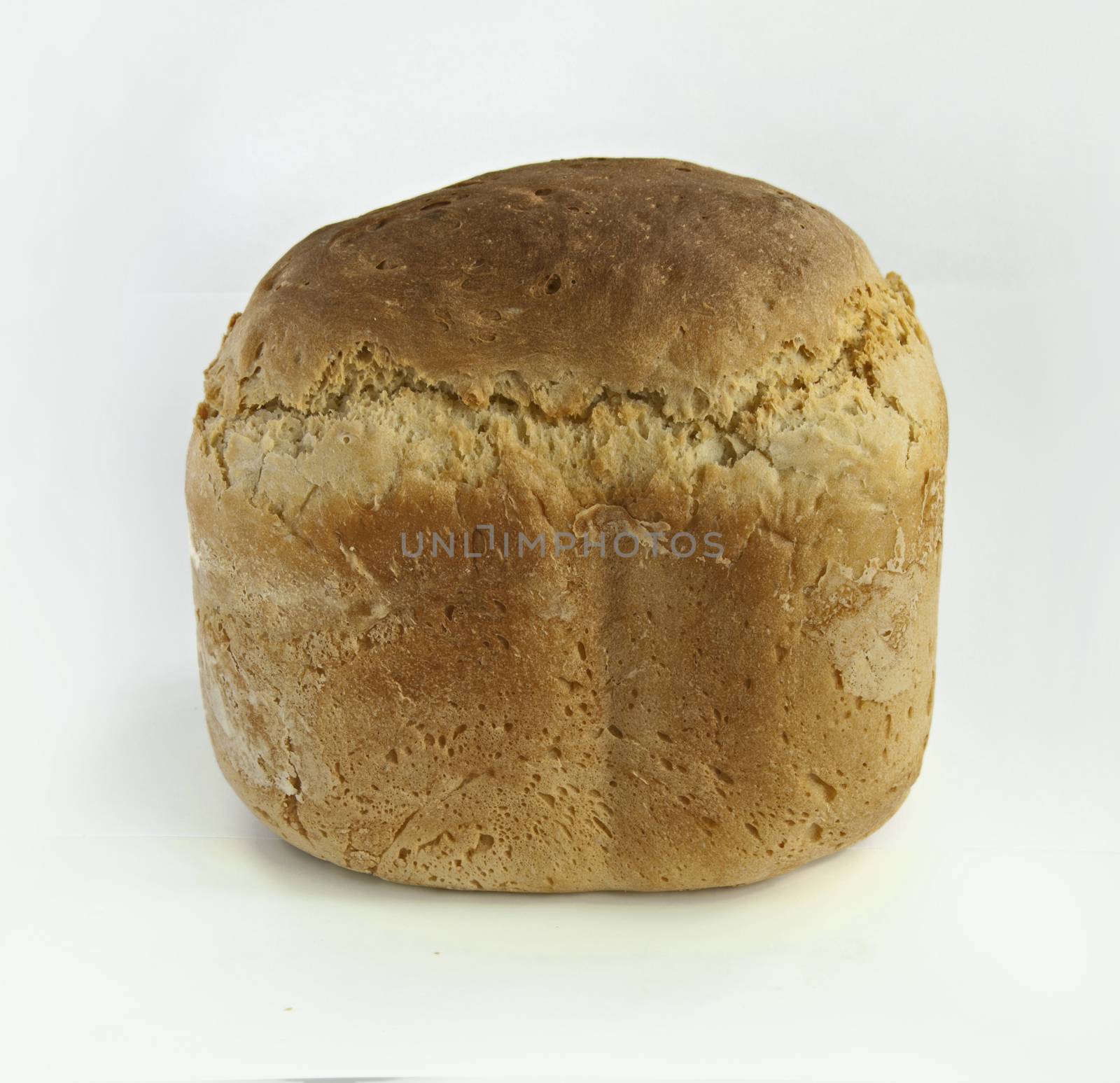 Homemade whole bread.White isolated