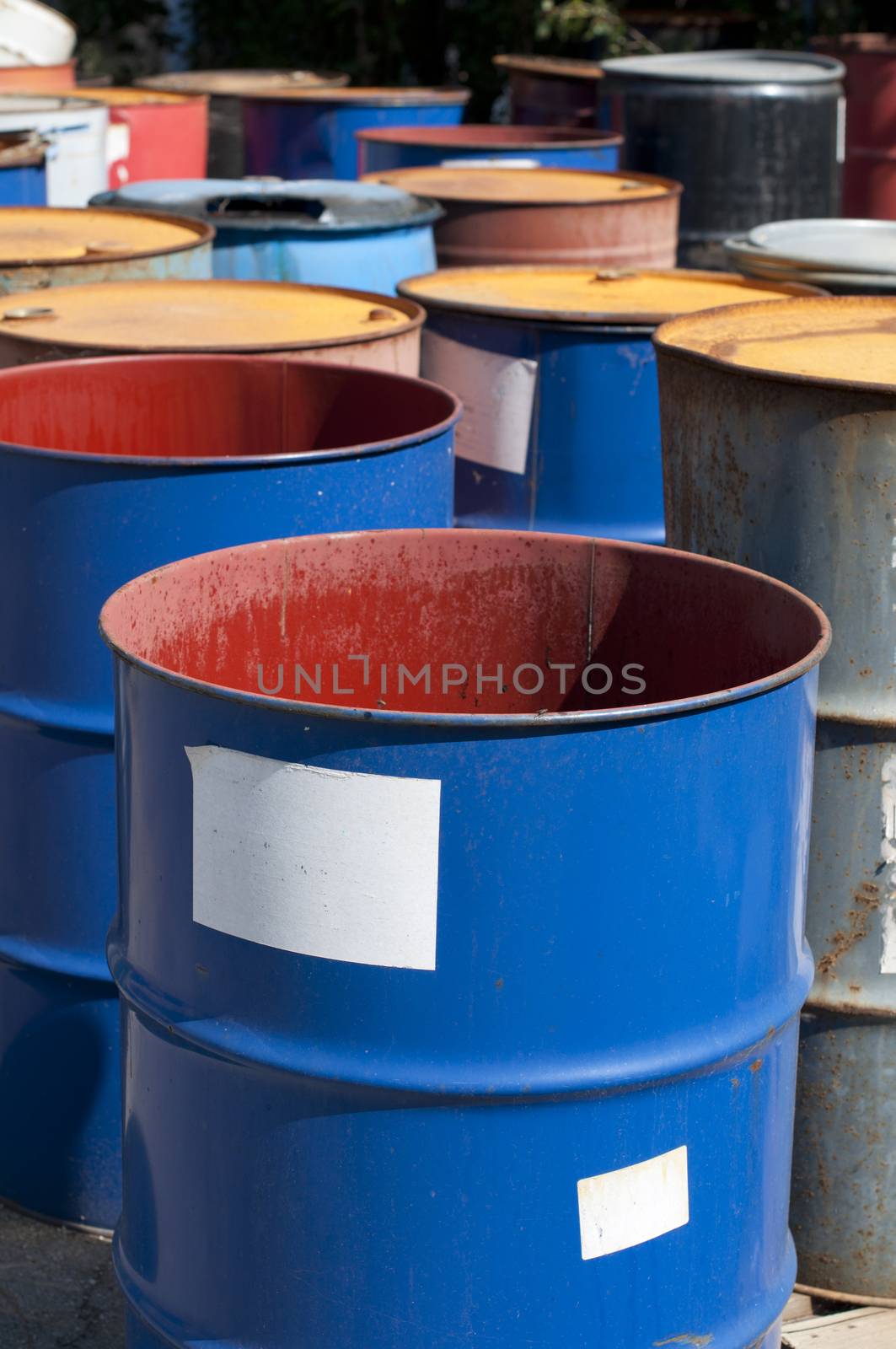 Old colored barrels for oil products by deyan_georgiev