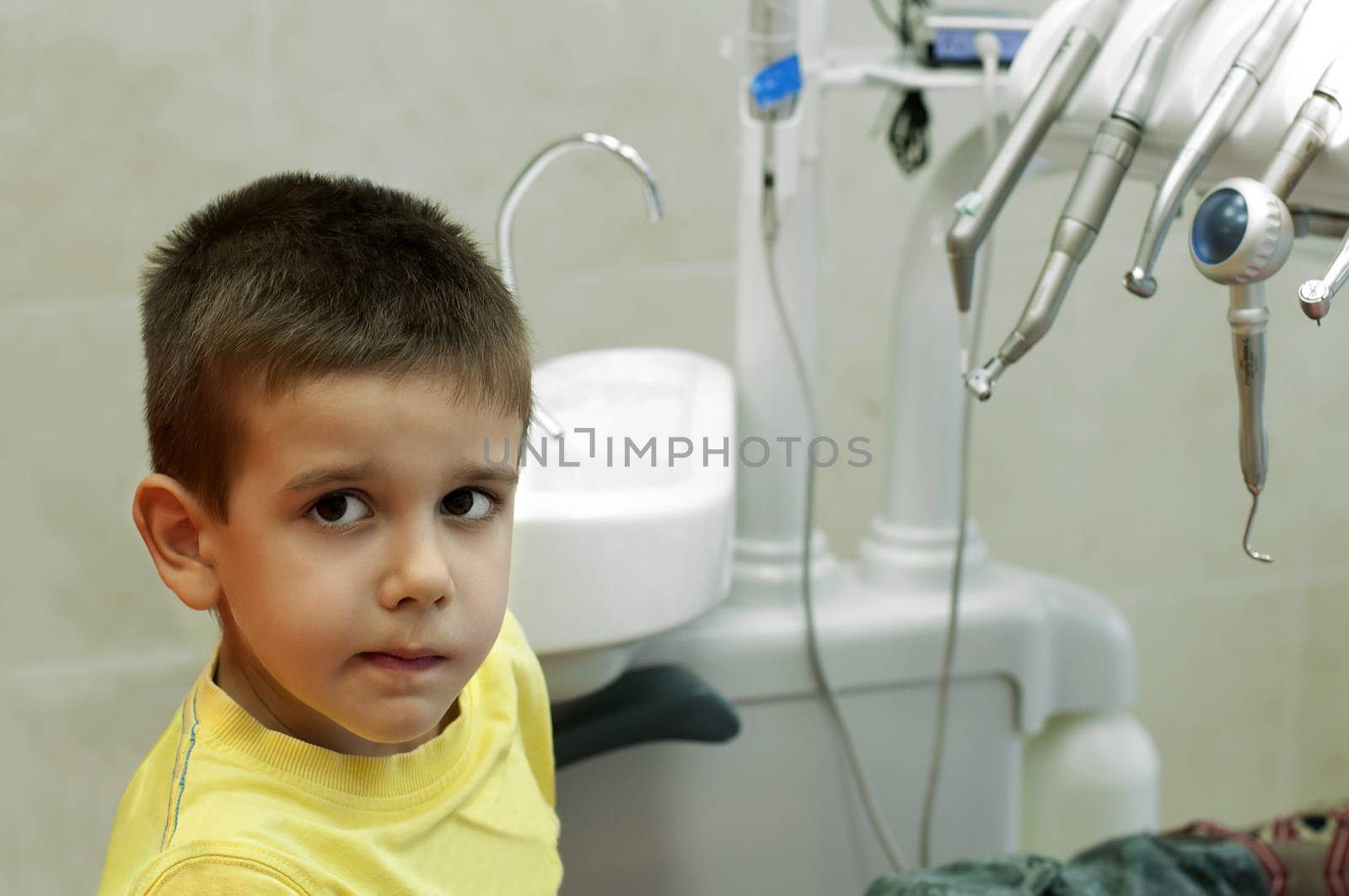 Child in a dentist's chair by deyan_georgiev